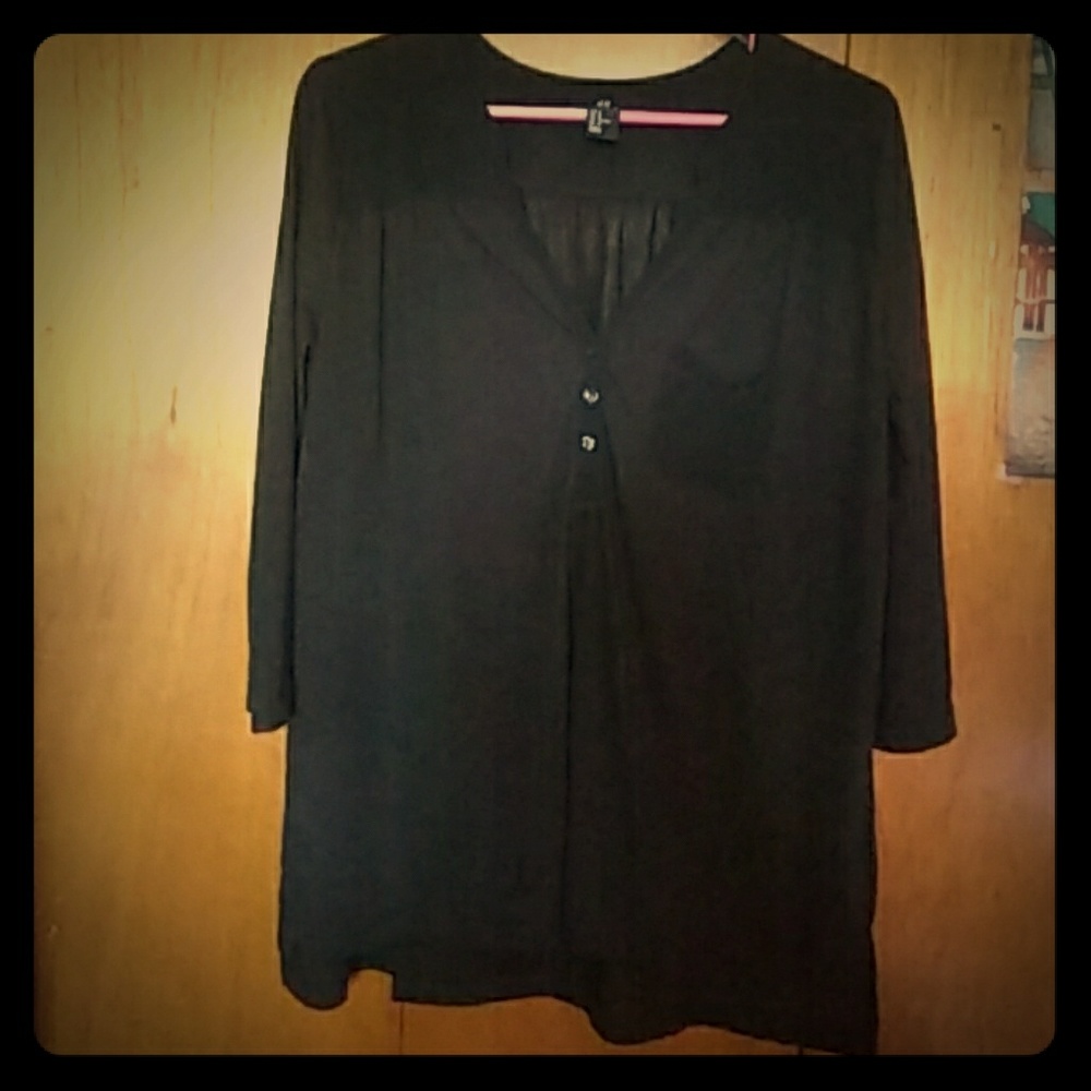 Black loose fitting semi see-thru blouse from H&M